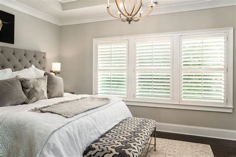 white shutter blinds bedroom.